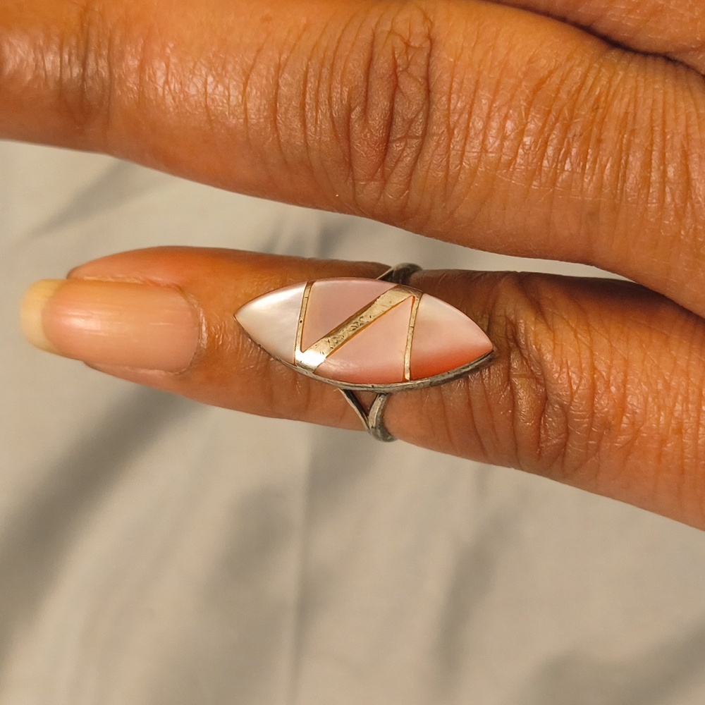 A vintage 925 sterling silver pink jade ring child size